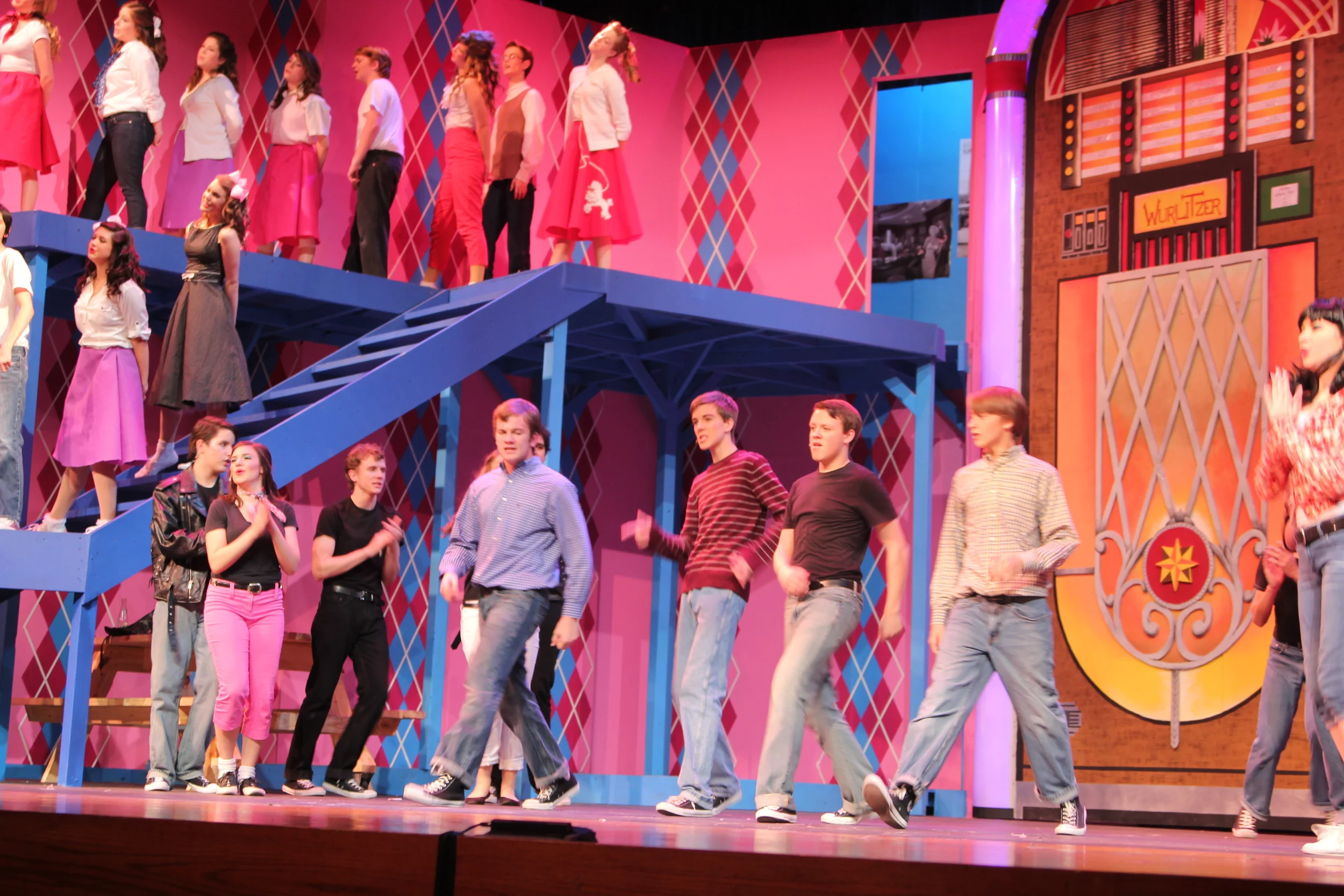   Grease   Directed by: Maggie Rodriguez  Production Designer and Technical Director: Joshua Heerssen 