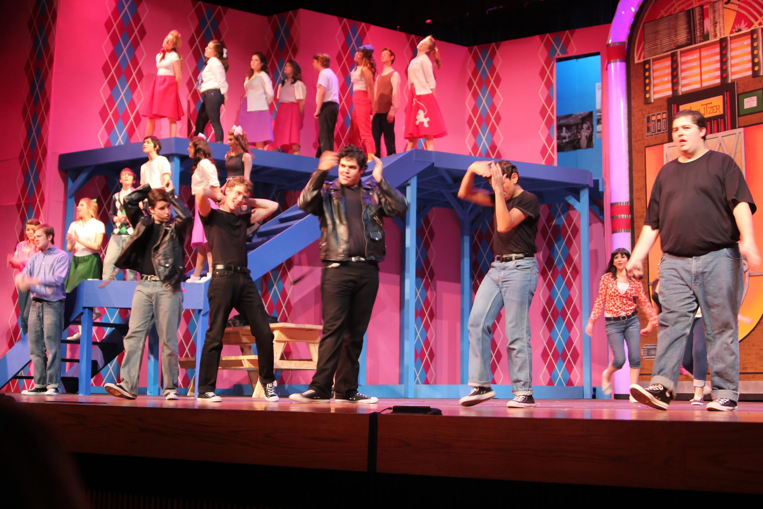   Grease   Directed by: Maggie Rodriguez  Production Designer and Technical Director: Joshua Heerssen 