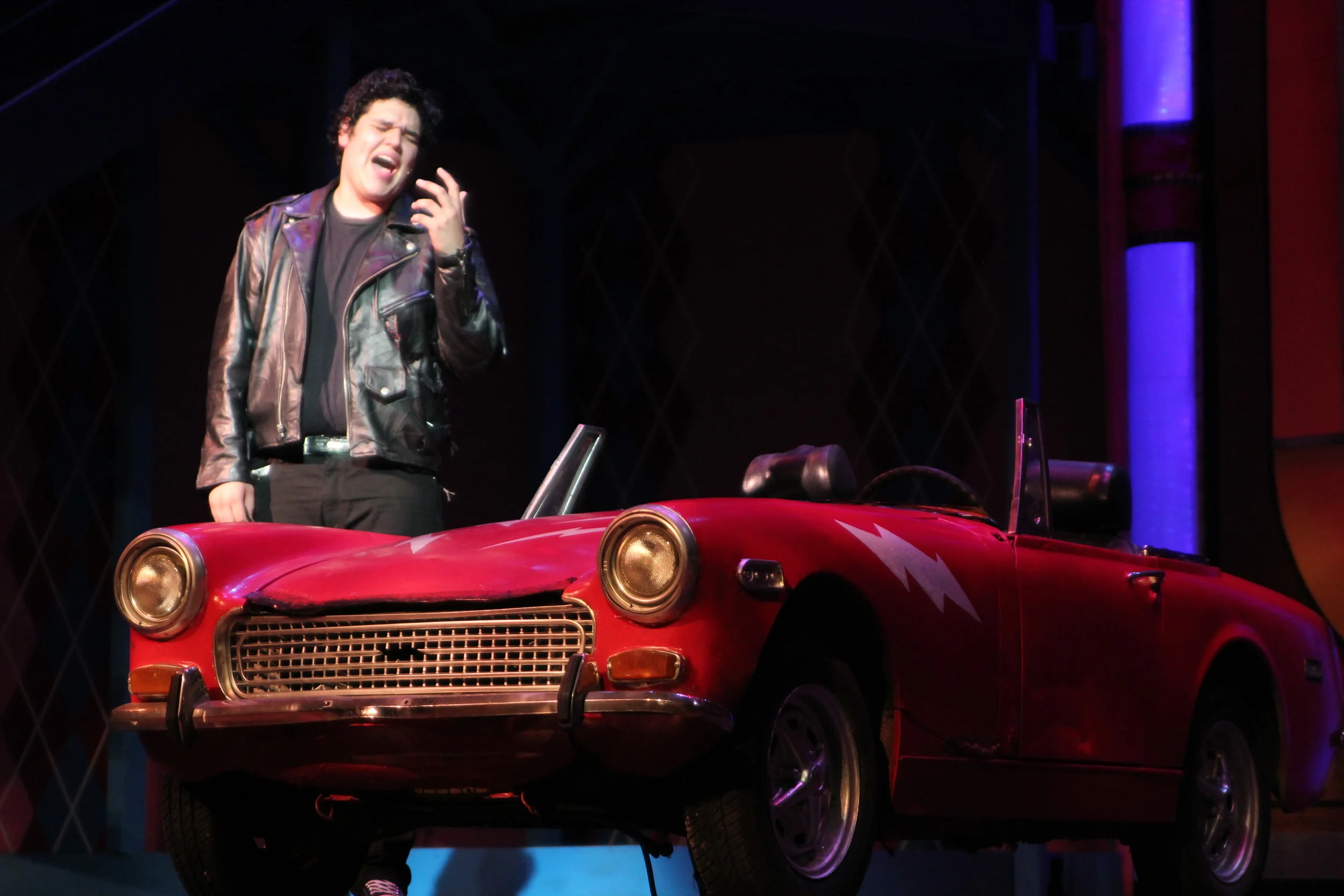   Grease   Directed by: Maggie Rodriguez  Production Designer and Technical Director: Joshua Heerssen 