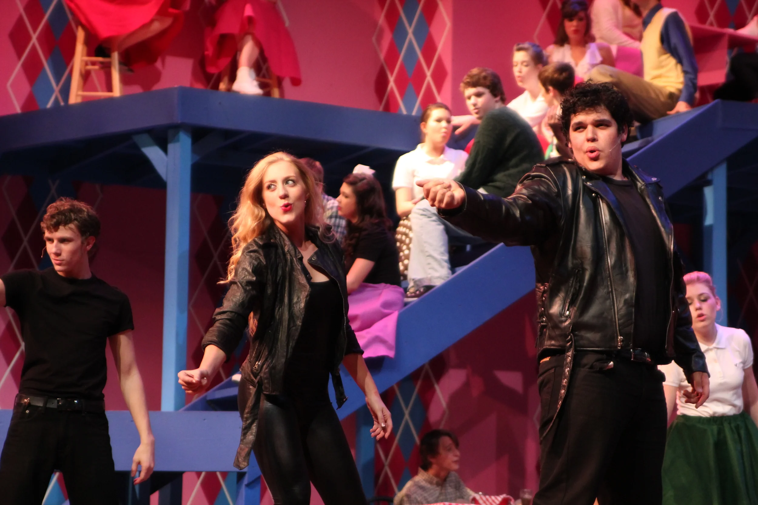   Grease   Directed by: Maggie Rodriguez  Production Designer and Technical Director: Joshua Heerssen 