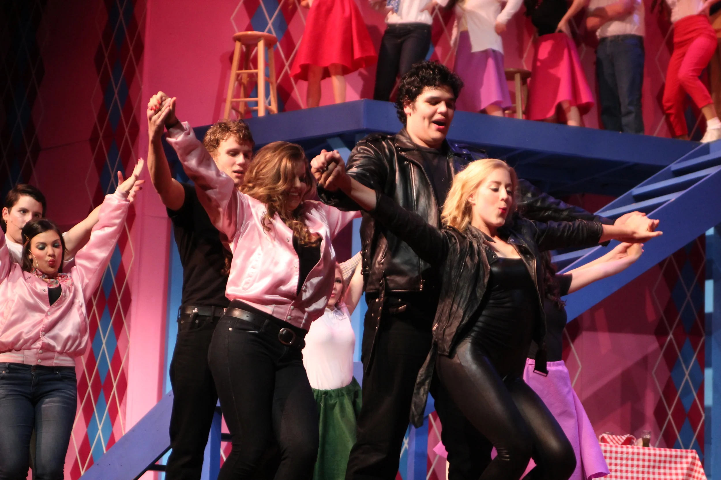   Grease   Directed by: Maggie Rodriguez  Production Designer and Technical Director: Joshua Heerssen 