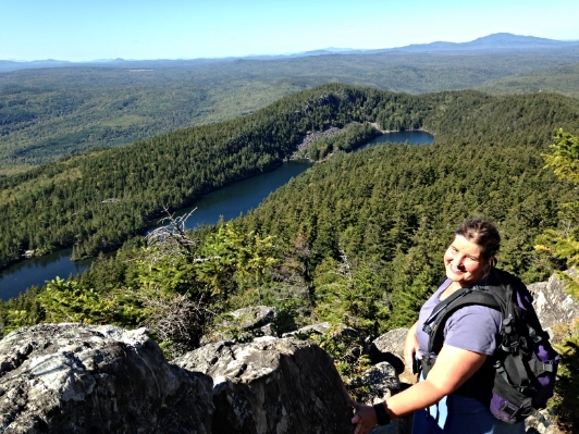 Clarissa taking in the amazing view on the up Borestone Mountain. The lodge is down below on the waterfront.