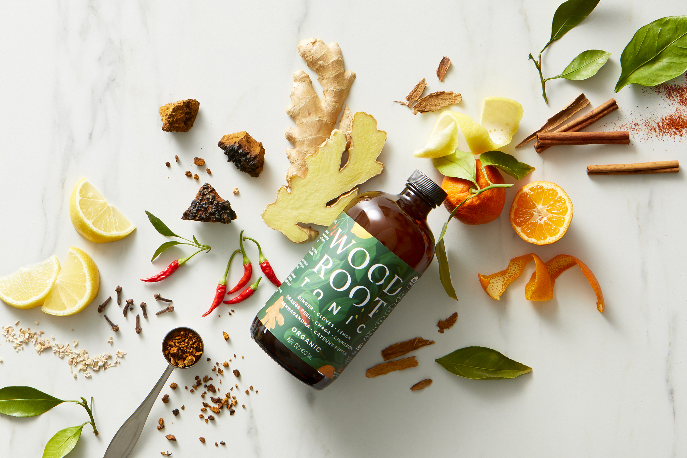 Woodroot_Tonic_Splash_Product_Web.png