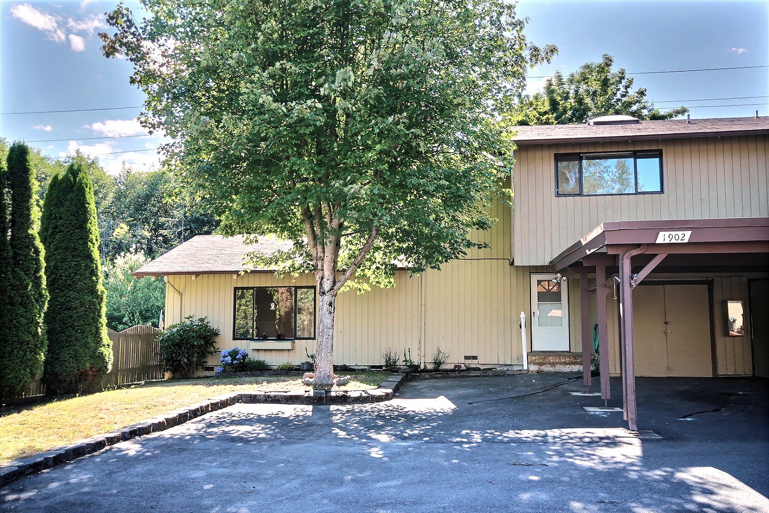 Rarely do you find a 3 bedroom, 1.75 bath townhome condominium with a massive 2200 SF yard and deck. This 3 bed, 1.75 bath, end unit townhouse also features a large family room with pellet stove, dining room, and totally remodeled kitchen! Covered parking, 3 total spaces, adjacent to condominium park area, storage, fully fenced yard. Low dues, quiet complex, close to everything. Sunny entertainment deck off the living room with no rear neighbors! Skylights, extra storage, updated windows. 3 bed, 1.75 bath, 1401 SF, 2200 SF deck and yard, 2 story townhome, huge living room, remodeled kitchen.