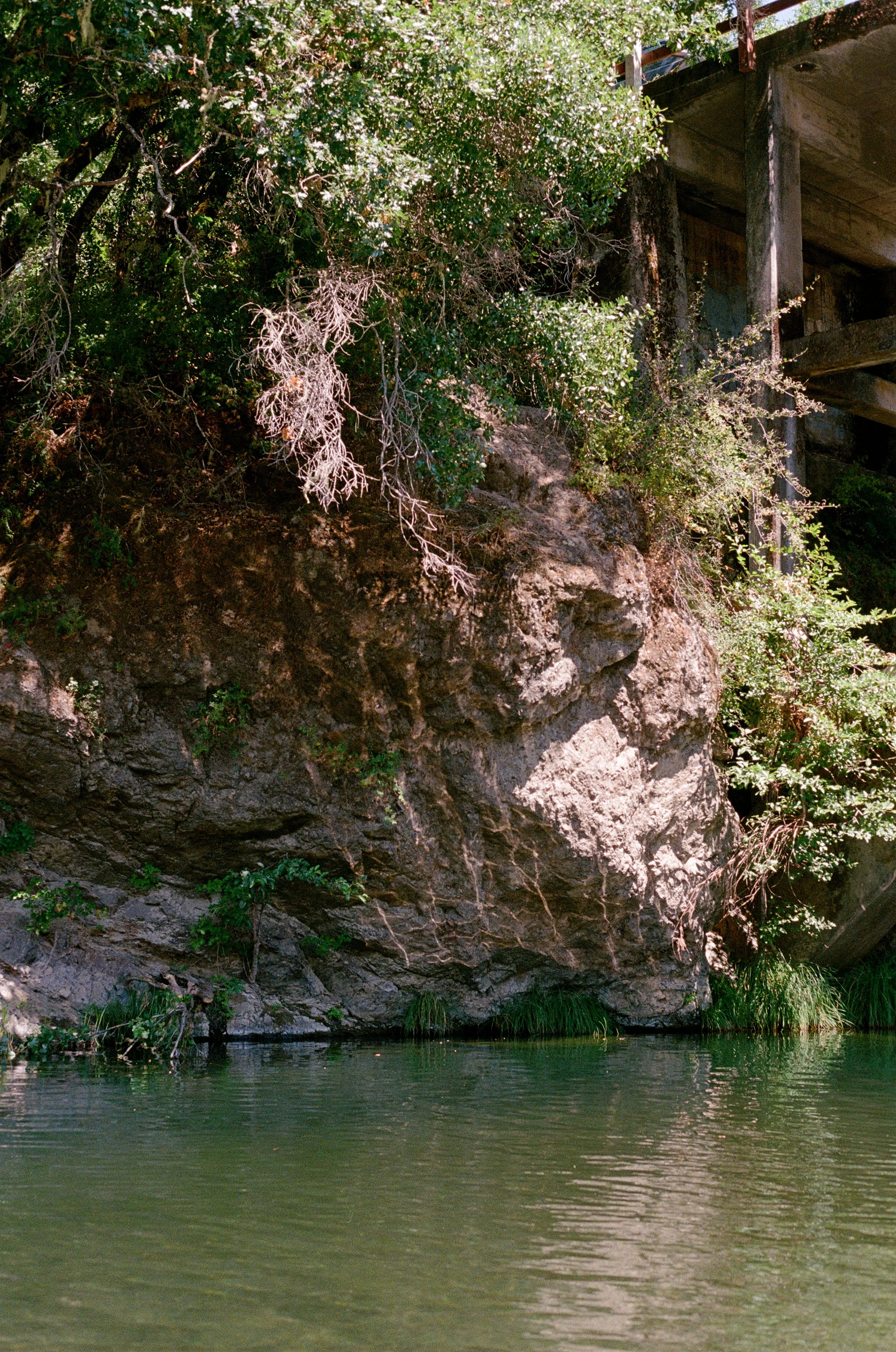 water reflection onto rock