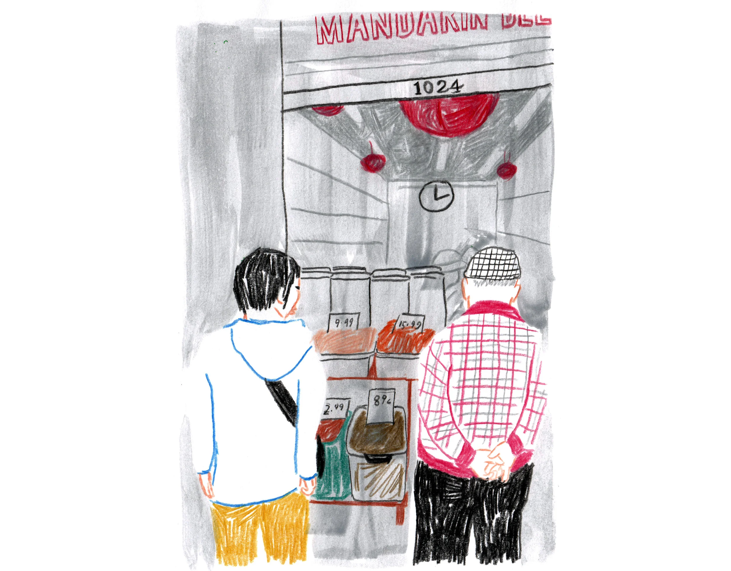 Couple looking at produce outside a shop in San Francisco's Chinatown.
