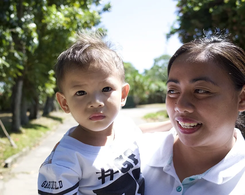 Former staff holding a future volunteer