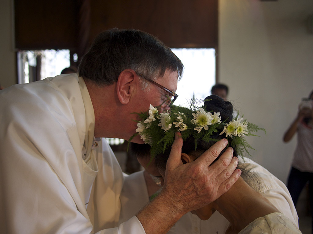 Volunteer Chaplain blessing the newlyweds