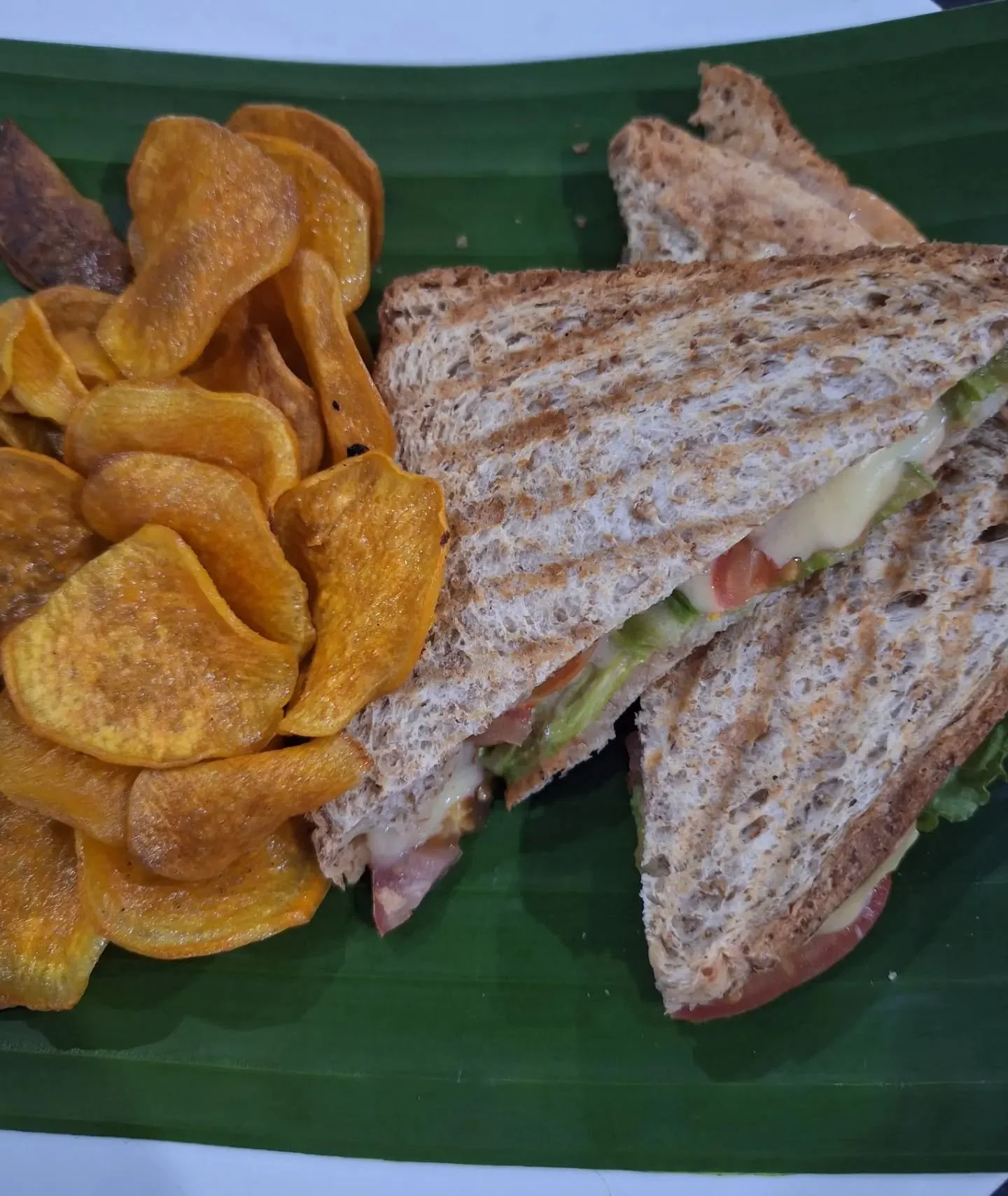 A grilled cheese toastie served with kamote chips!
The best snack for any time of day.

Available at the cafe, or order on Grab.

#naturalgardencafe #grabfood #bacolodcity