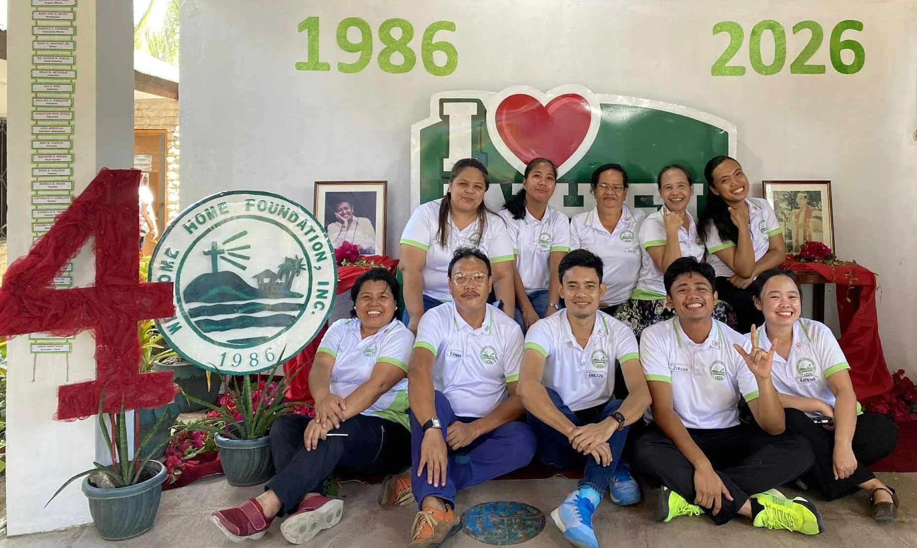 Staff celebrating the organisations 40th anniversary