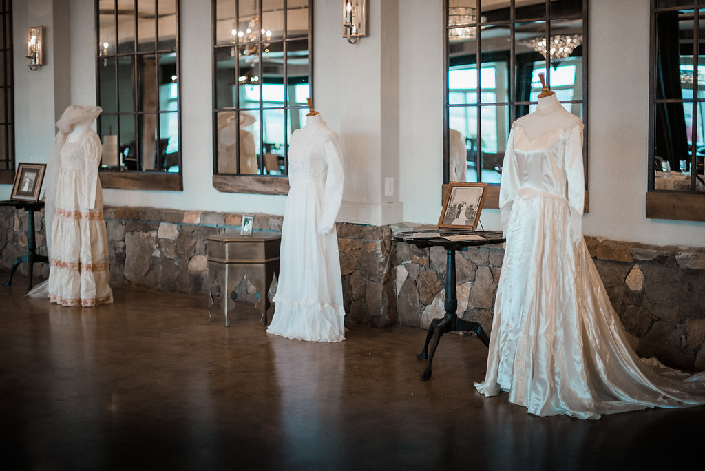 All three vintage wedding dresses with pictures of the ladies in them were on display for guests to see during the reception. What a sweet and sentimental way to ring in the next generation of Mrs! 