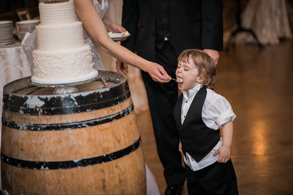 Kris and Megan also had a surprise visitor partake in their cake cutting. With a face that cute, how could you say no?