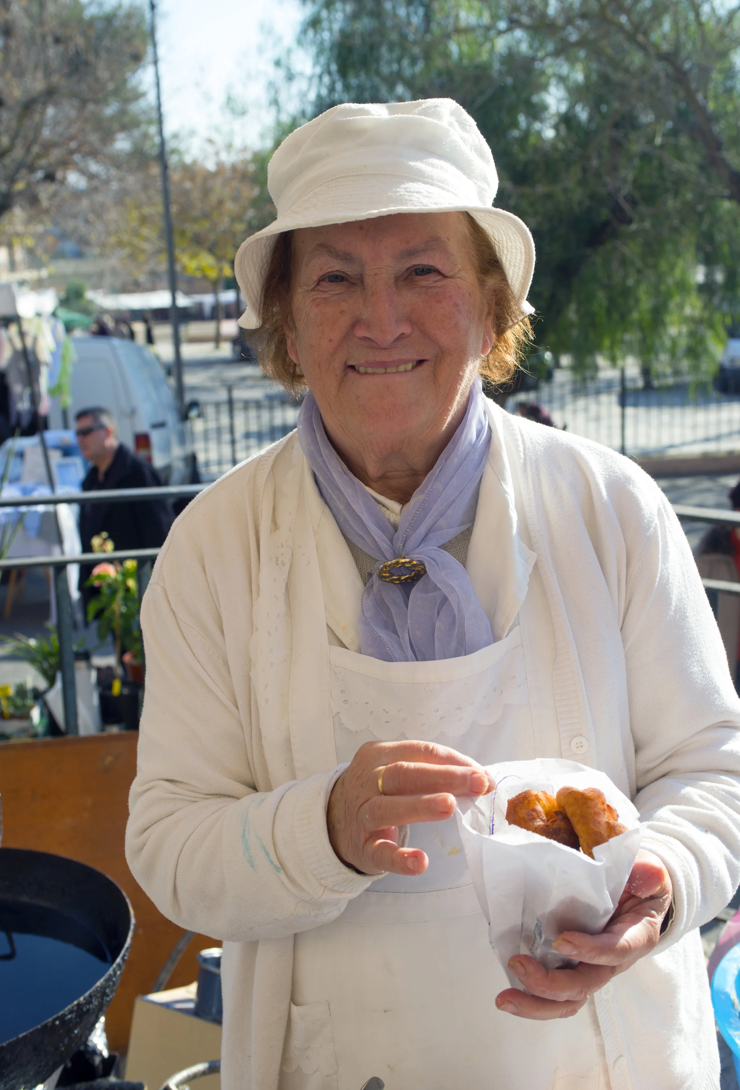 Warm donuts at the Sineu market, Mallorca Spain.