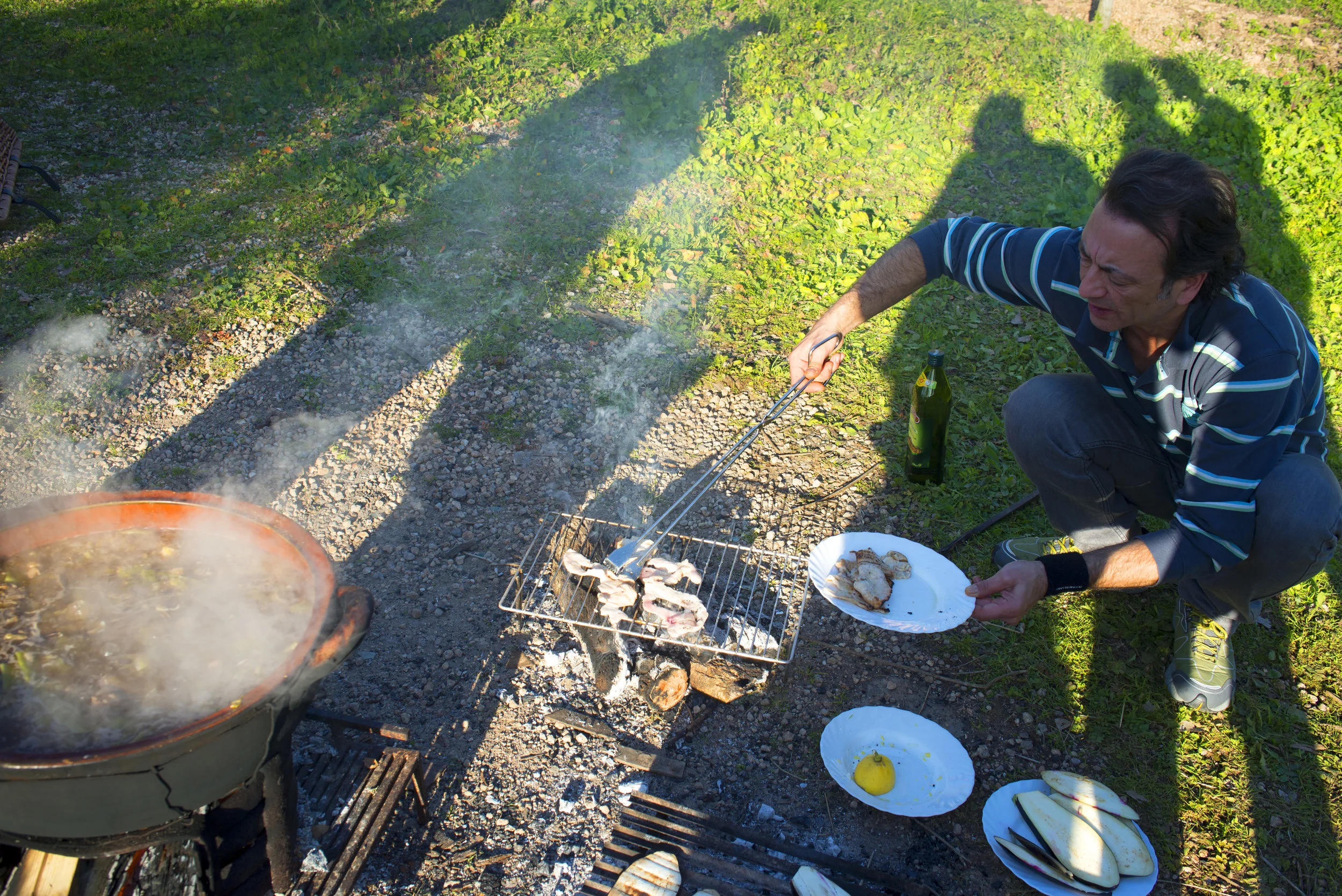 Cooking Arrós Brut it is Mallorcan specialty, many families has their own variations. The name translates as dirty rice. Campos, Mallorca Spain.