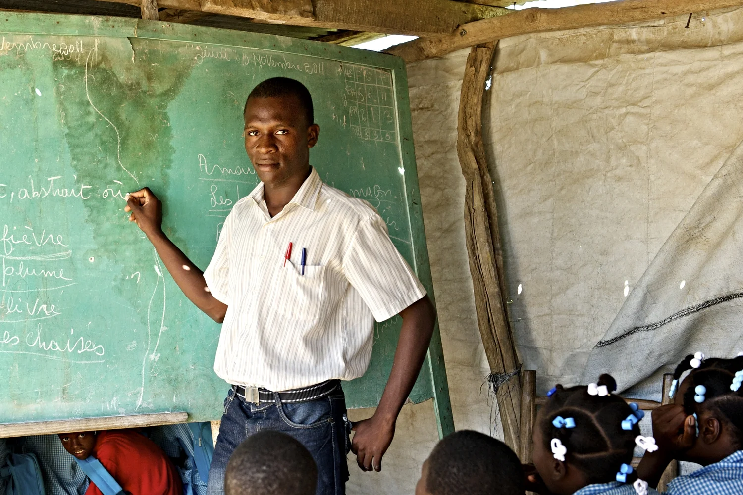 Lubenson Charles is a teacher in Fort Resolu. Because the village is very poor, teachers at this school volunteer their skills.