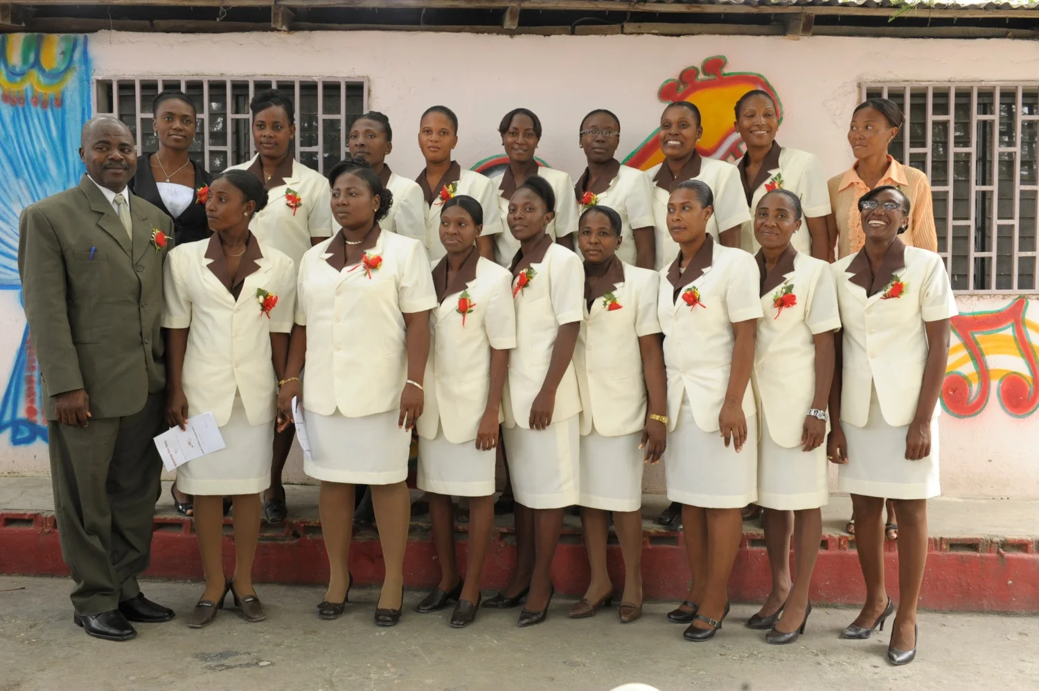 Graduation Day! Class of 2011 with hospital administrator and instructors.