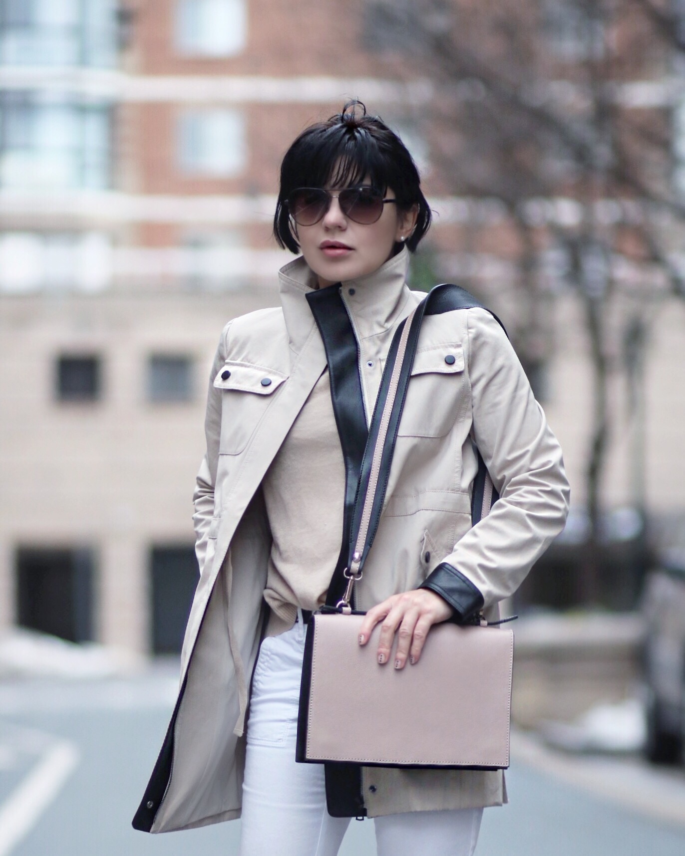 beige trench coat and bag
