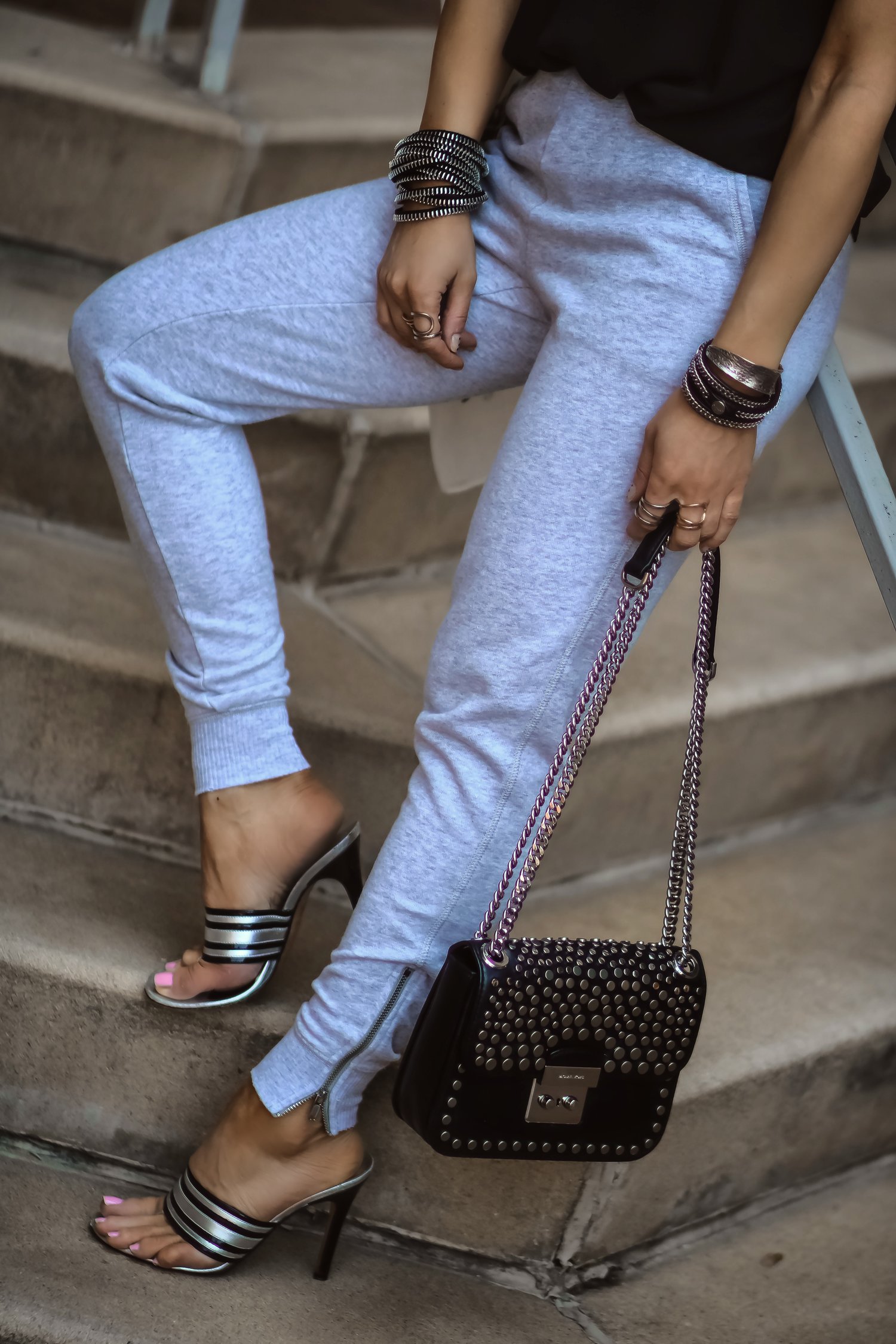 Isabel-Alexander-Aerie-light-grey-joggers-close-up-bracelets