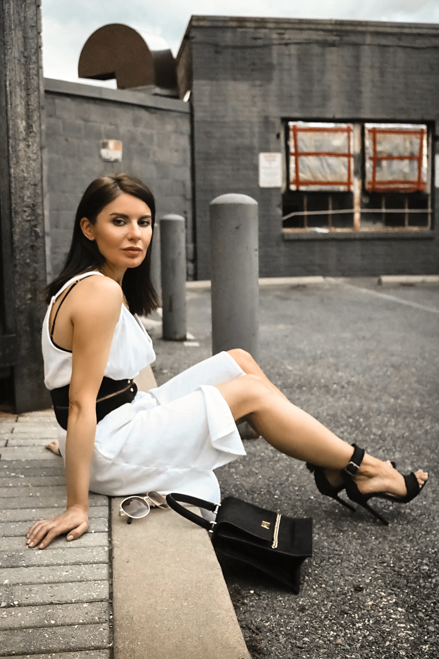 Isabel Alexander Sitting Down Pavement Wearing Old Navy Linen Dress