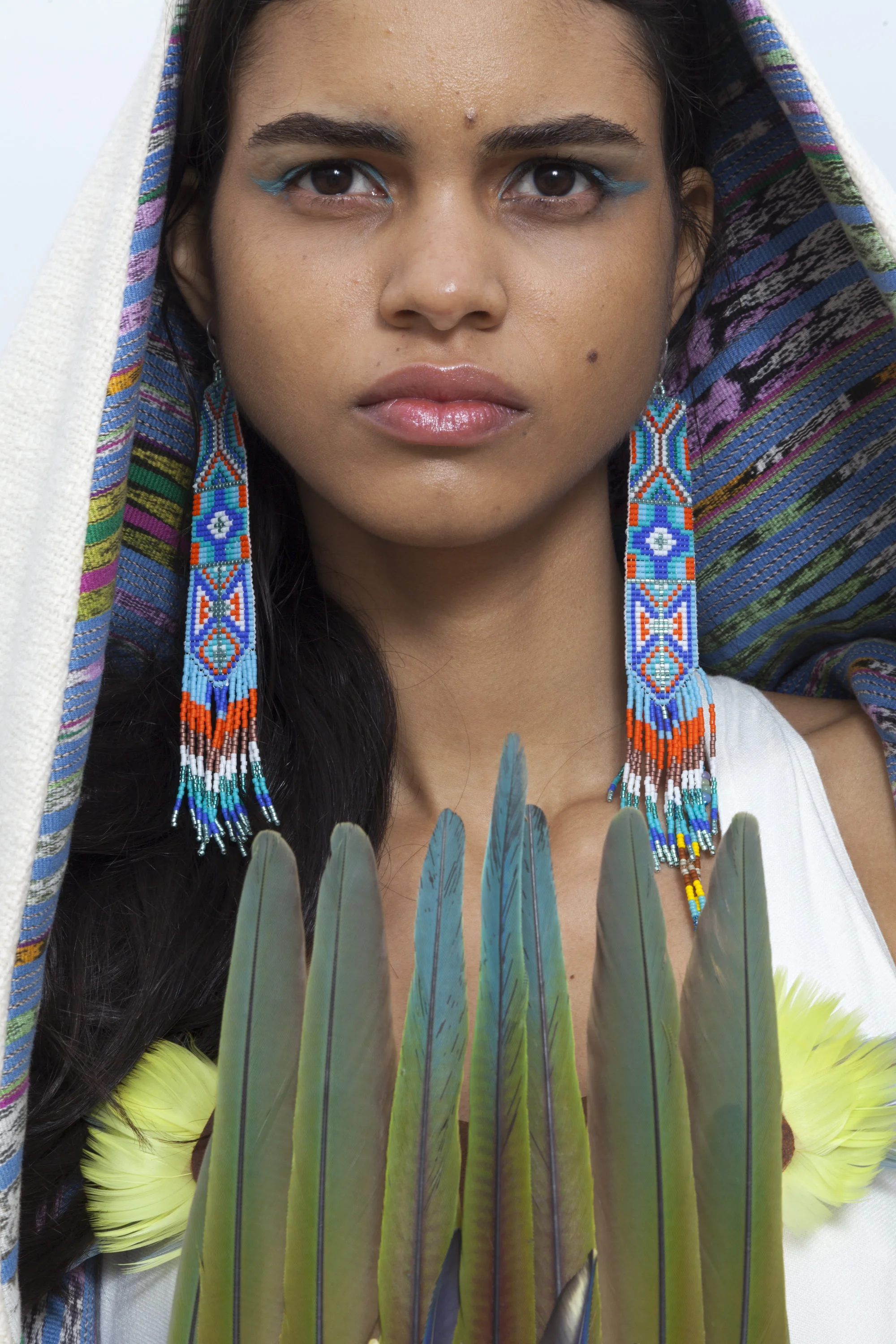 Cloak by Xango Shola Earrings by Flying Bear and Fan by both artists