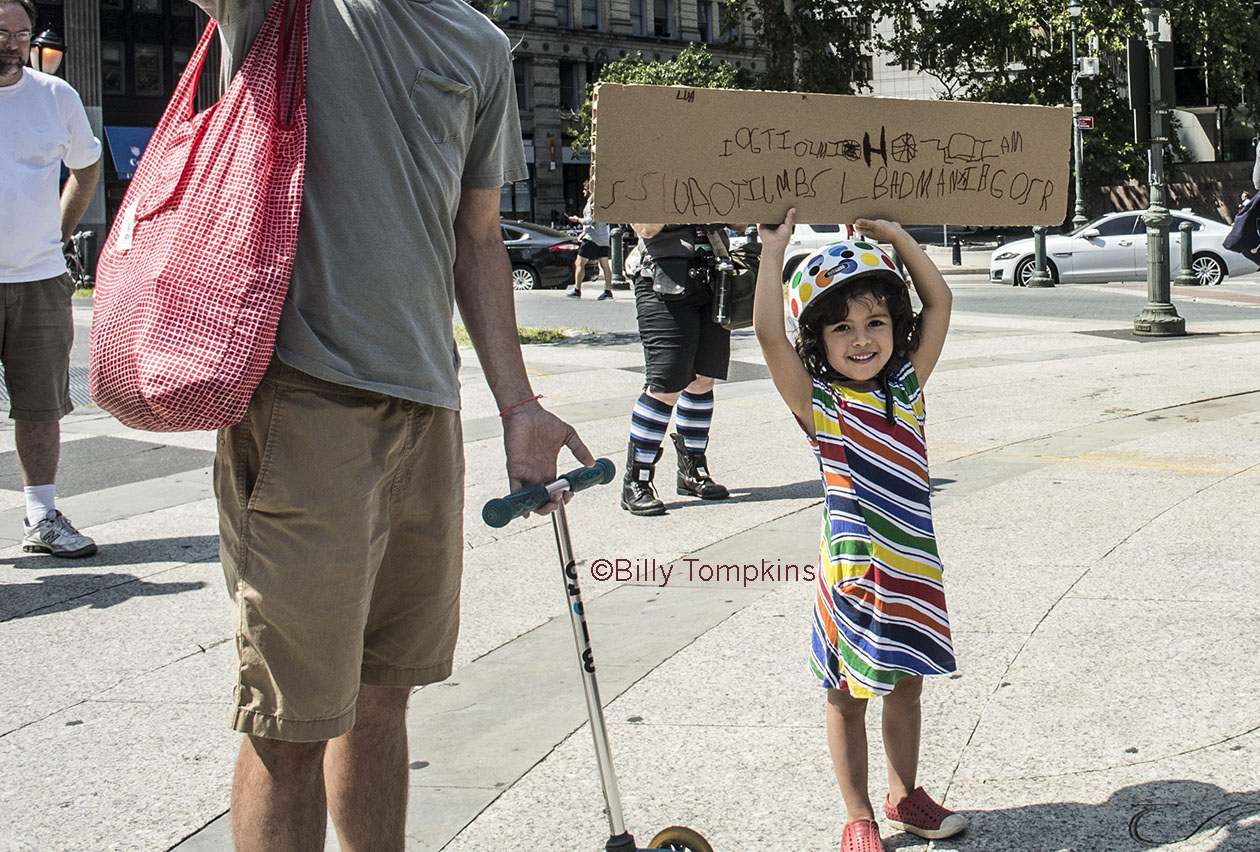  Little girl  with her first ever, self made  protest sign 