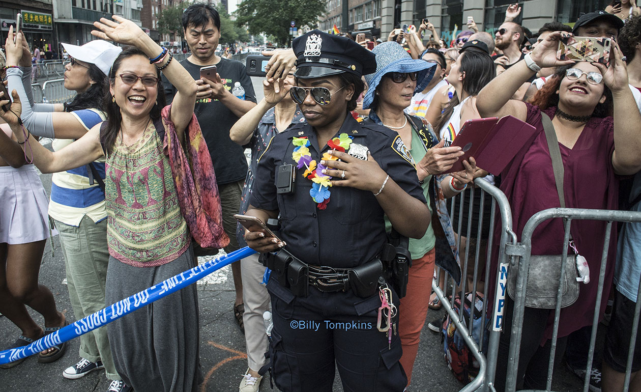 Female cop during Gay Pride parade / NYC