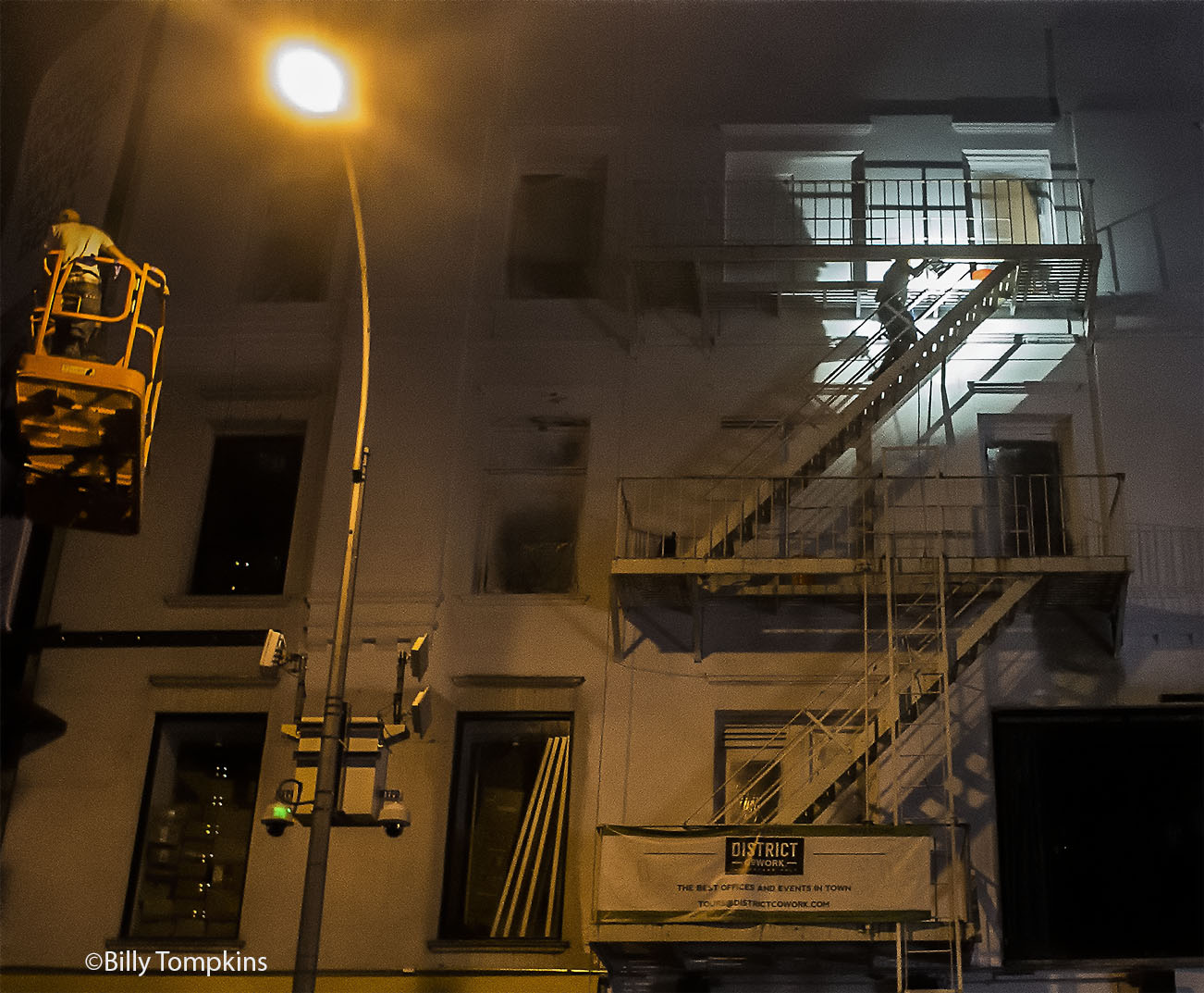  night time painter  climbing the fire escape with a lantern  after midnight 