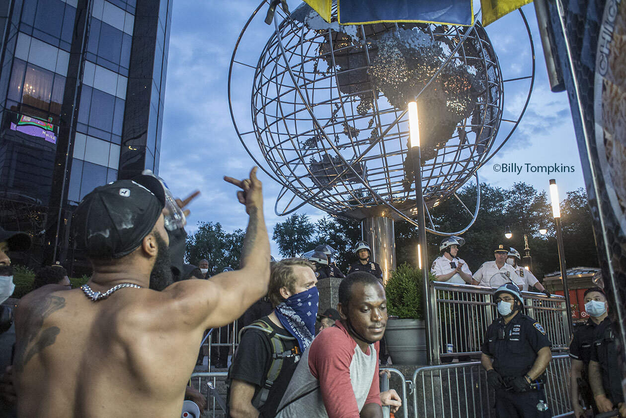  Man giving the fingers to the Police.  Black Lives Matter Protest  New York City / 2020 