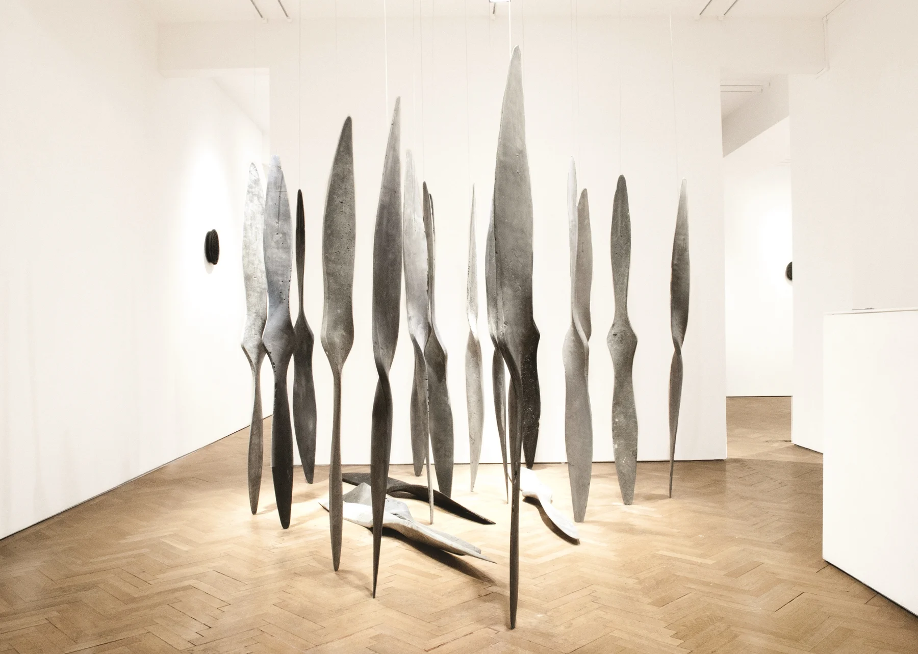 Burning Meteors Leave no Dust, 2013 Modified aircraft propeller cast in concrete, aircraft cable