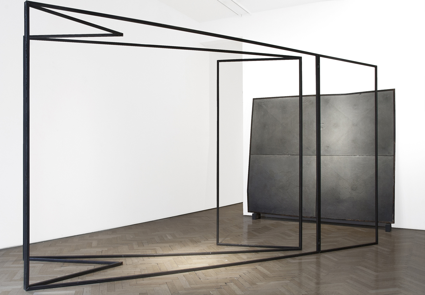 untitled (folded studio), 2015 & untitled (gate), 2015; perimeter of the artist's studio traced in steel, mounted on hinges/replica of a yard gate, cast in dust and soft flexible foam, metal armature