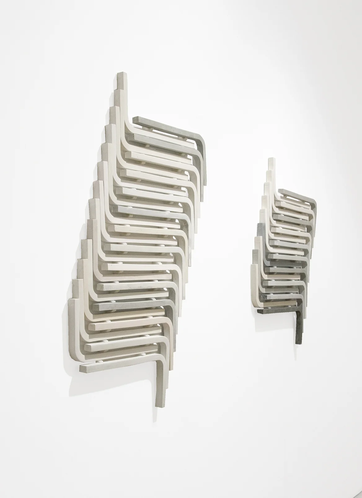 untitled (ikea stools diptych), 2015; copper dust, brass dust, steel dust, cast plaster,
