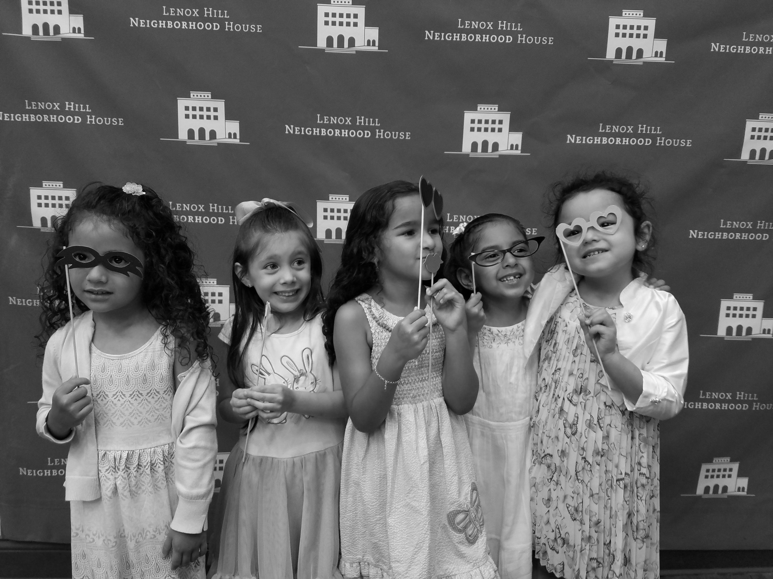 Group of Five Girls in Front of Neighborhood House Step and Repeat