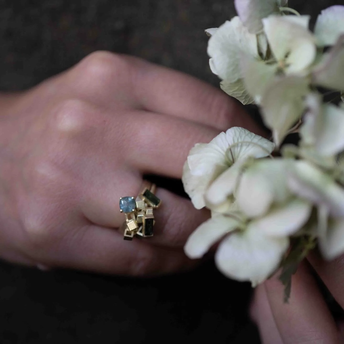 Cluster rings on hands with flowers 🌸
I love making these mini sculptures for your hand.
Some of these are one-of-a-kind and sold, but some are available and ready for a new home. 
I can also make you a cluster ring with heirloom gemstones making it