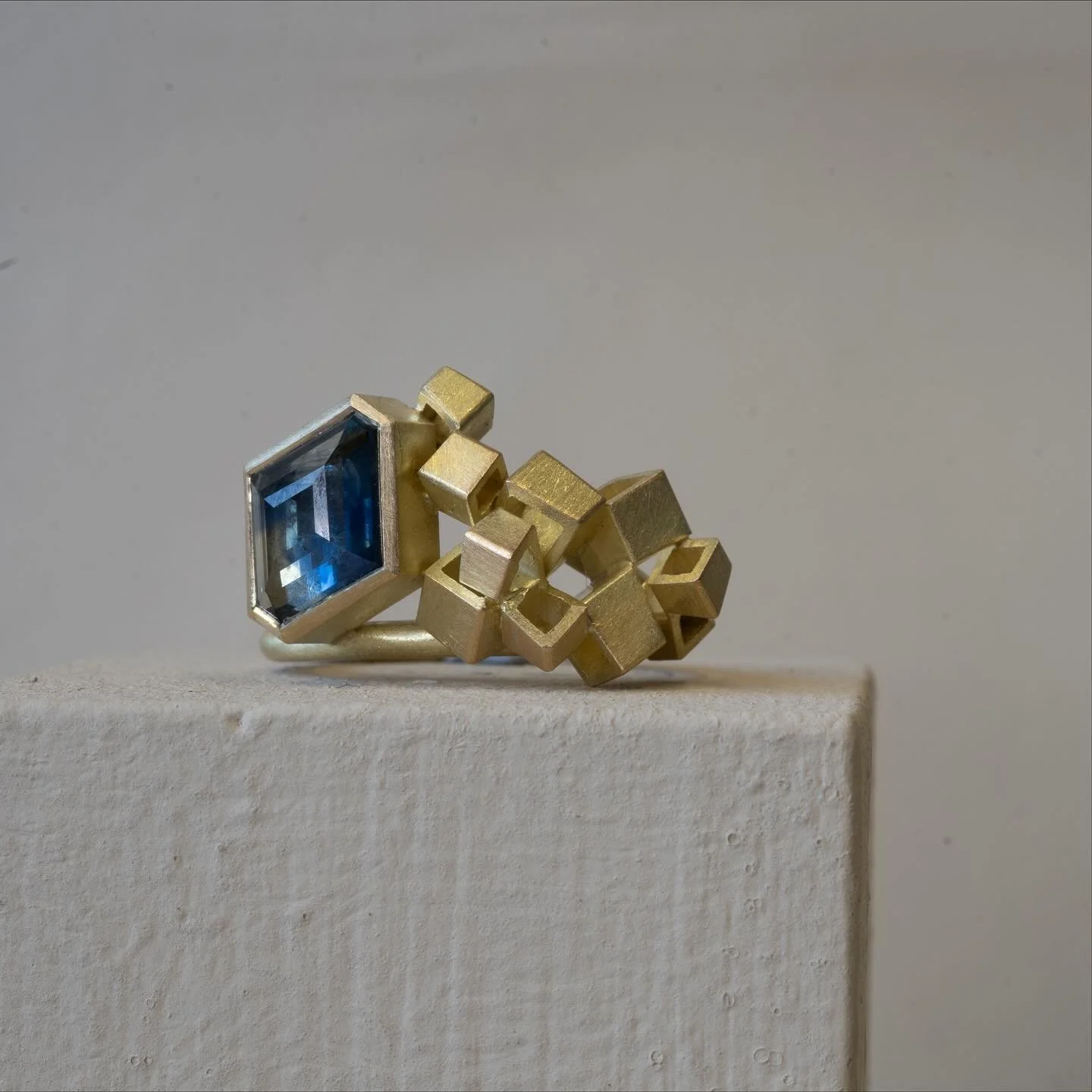 Introducing the Kite Cluster ring which made its debut at @goldsmithsfair this month. 
Made with a 2.11ct kite-shaped Montana Sapphire from @misfitdiamonds, making it a one-of-a-kind piece. I had the pleasure of talking about this ring and my work in