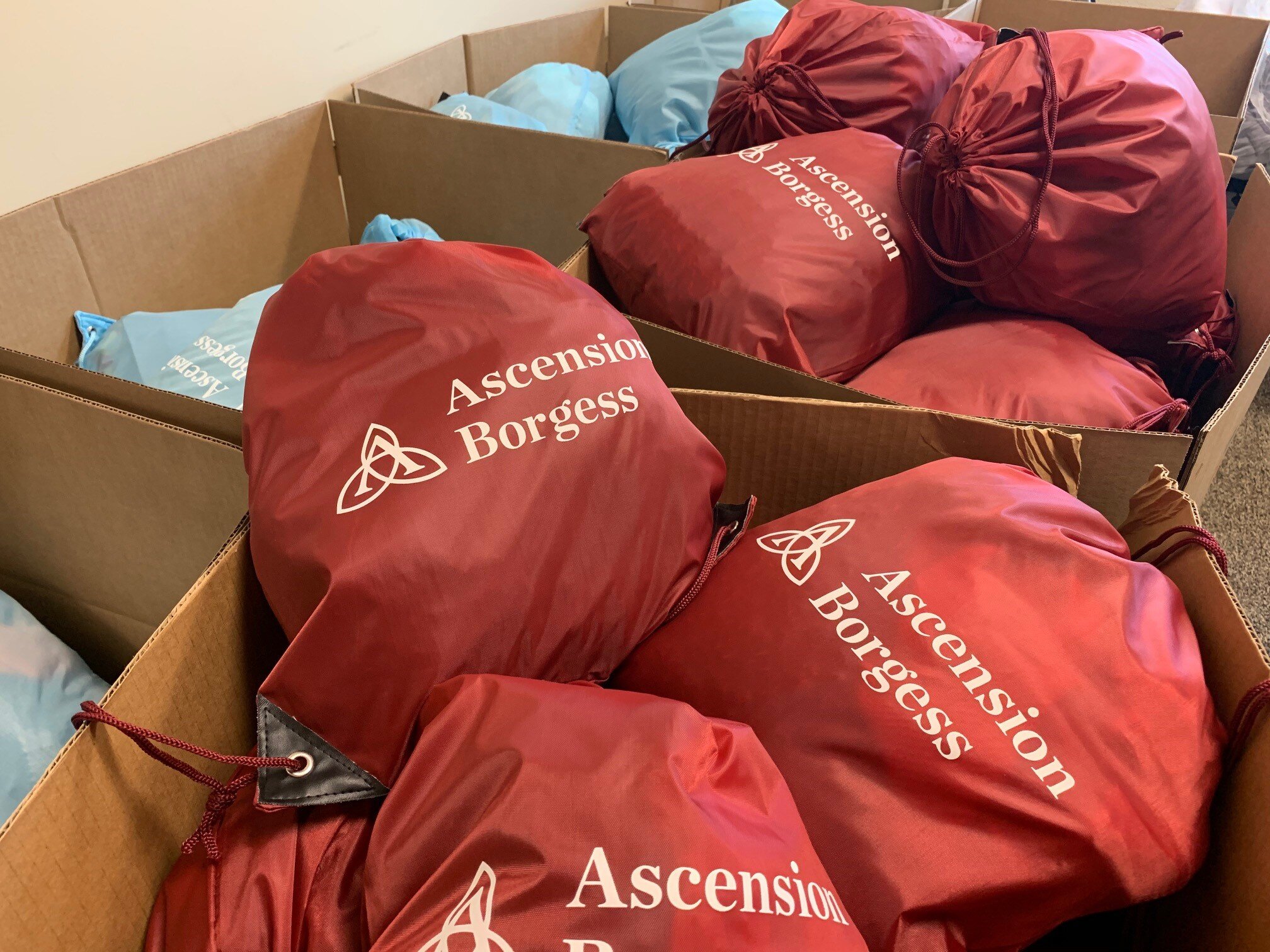  Thanks to our Christmas Day sponsor, Ascension Borgess, each of our members will receive their gifts in a reusable drawstring bag! 