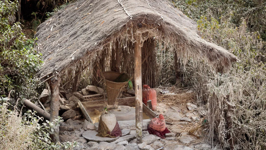 The water mill, grinding corn and rice flour.