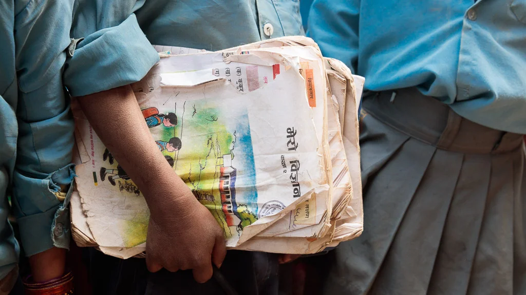 Children in these poorest of communities rarely have access or funds to buy school bags and Moving Mountain Nepal's donation day comes as a real surprise. These children rushed to put their books into the new bags as soon as they received them.