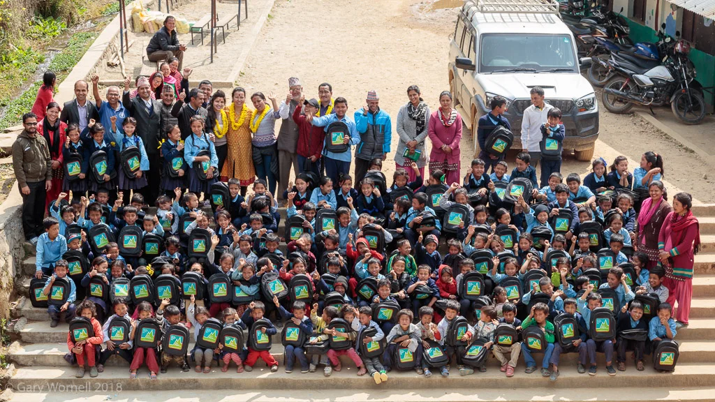Children from Shree Bhalchandra in Kavre gather for the group photo on the steps of the school.