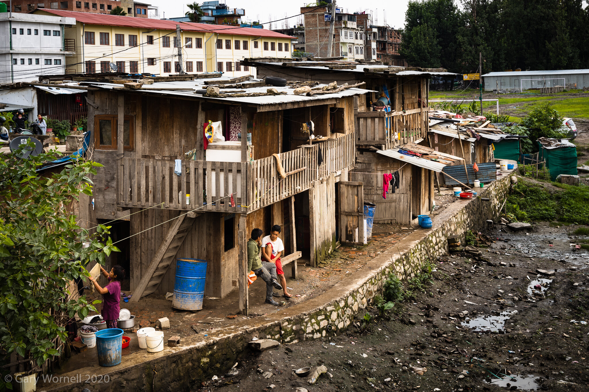  Wooden construction homes in the Teku slum area of Kathmandu on the banks of the Bagmati river, Kathmandu. 