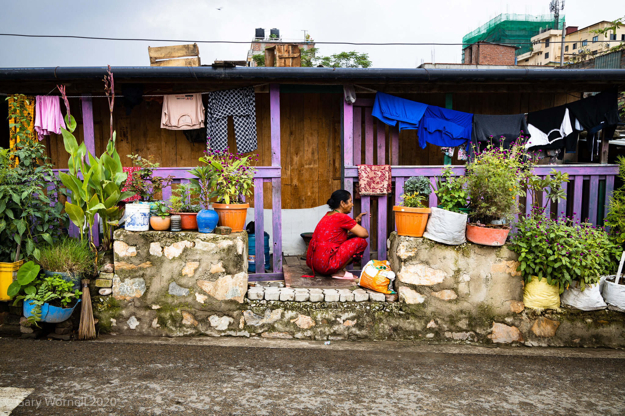  Woman outside her home in the slum area of Teku, Kathmandu. 