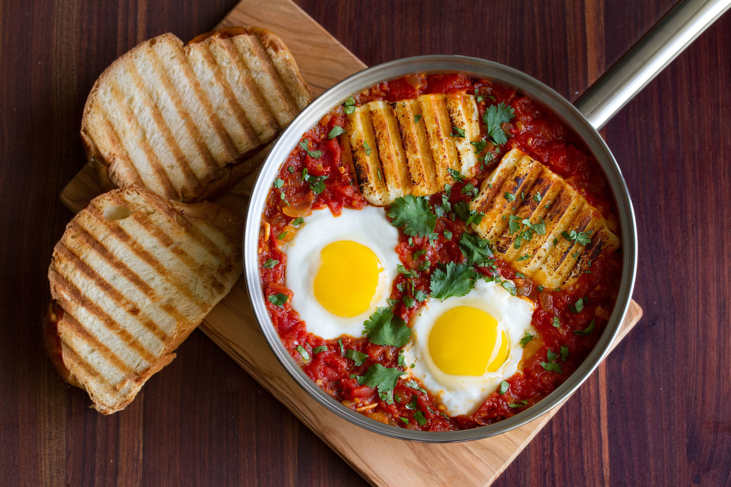 Spicy Baked Eggs with Halloumi Harissa Cooking with Cocktail Rings