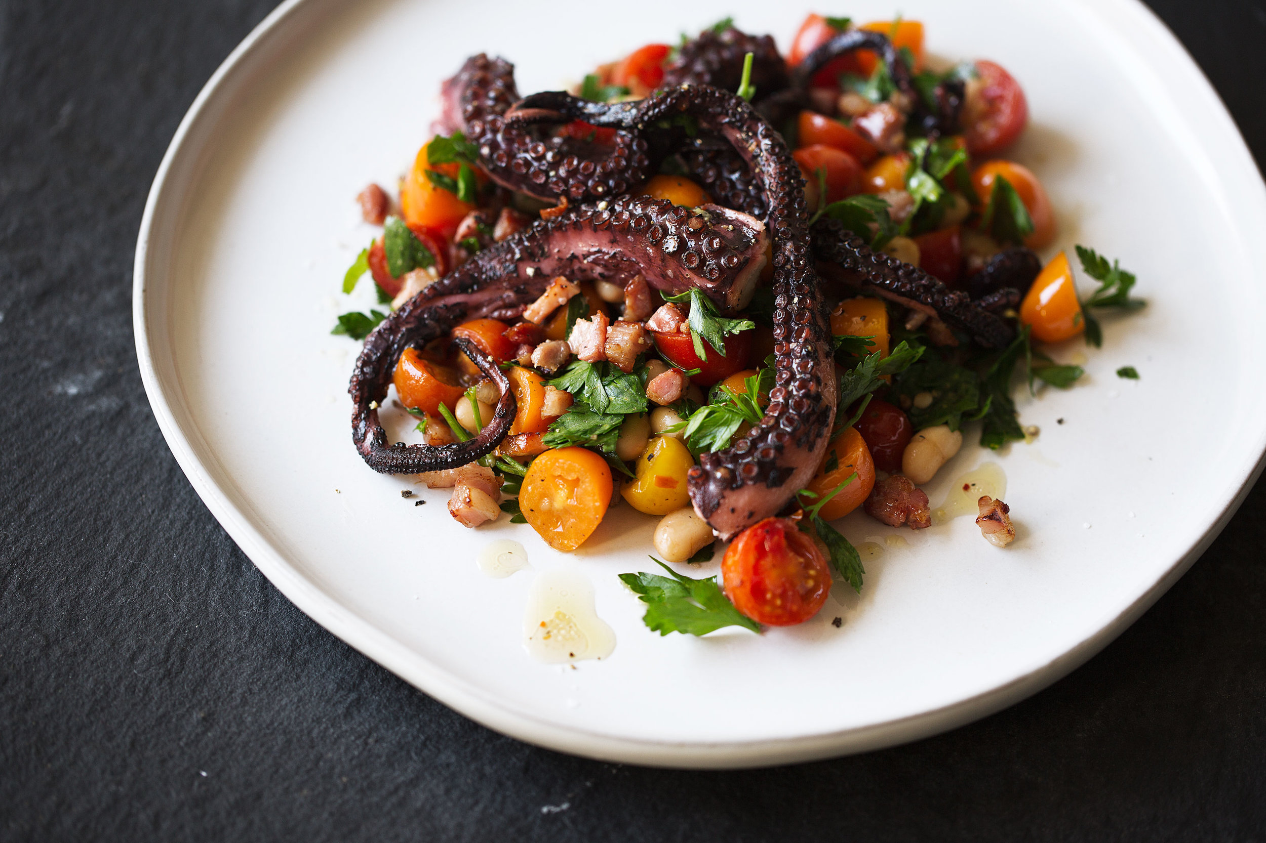 Charred Octopus With Warm White Bean And Tomato Salad And Guanciale Vinaigrette Cooking With Cocktail Rings