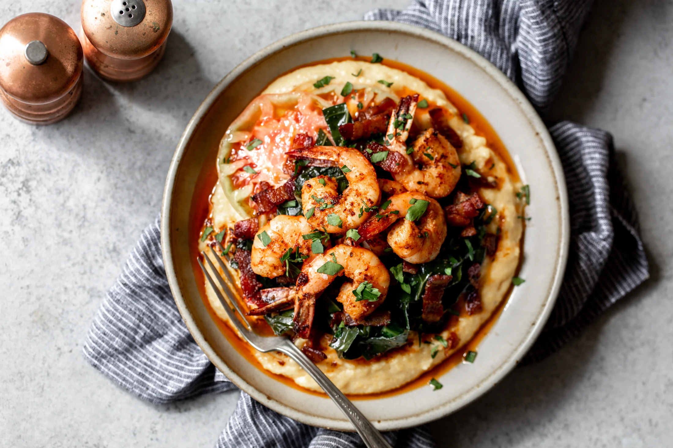 Cajun Shrimp with Cheesy Grits and Bacon Braised Collard Greens