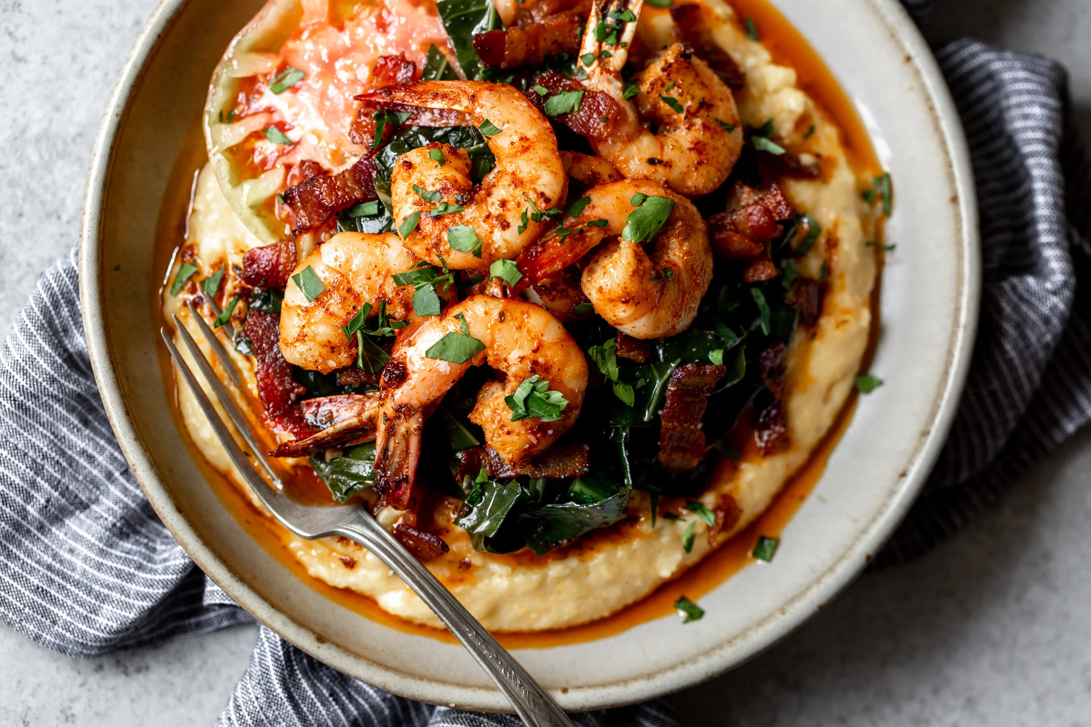Cajun Shrimp with Cheesy Grits and Bacon Braised Collard Greens