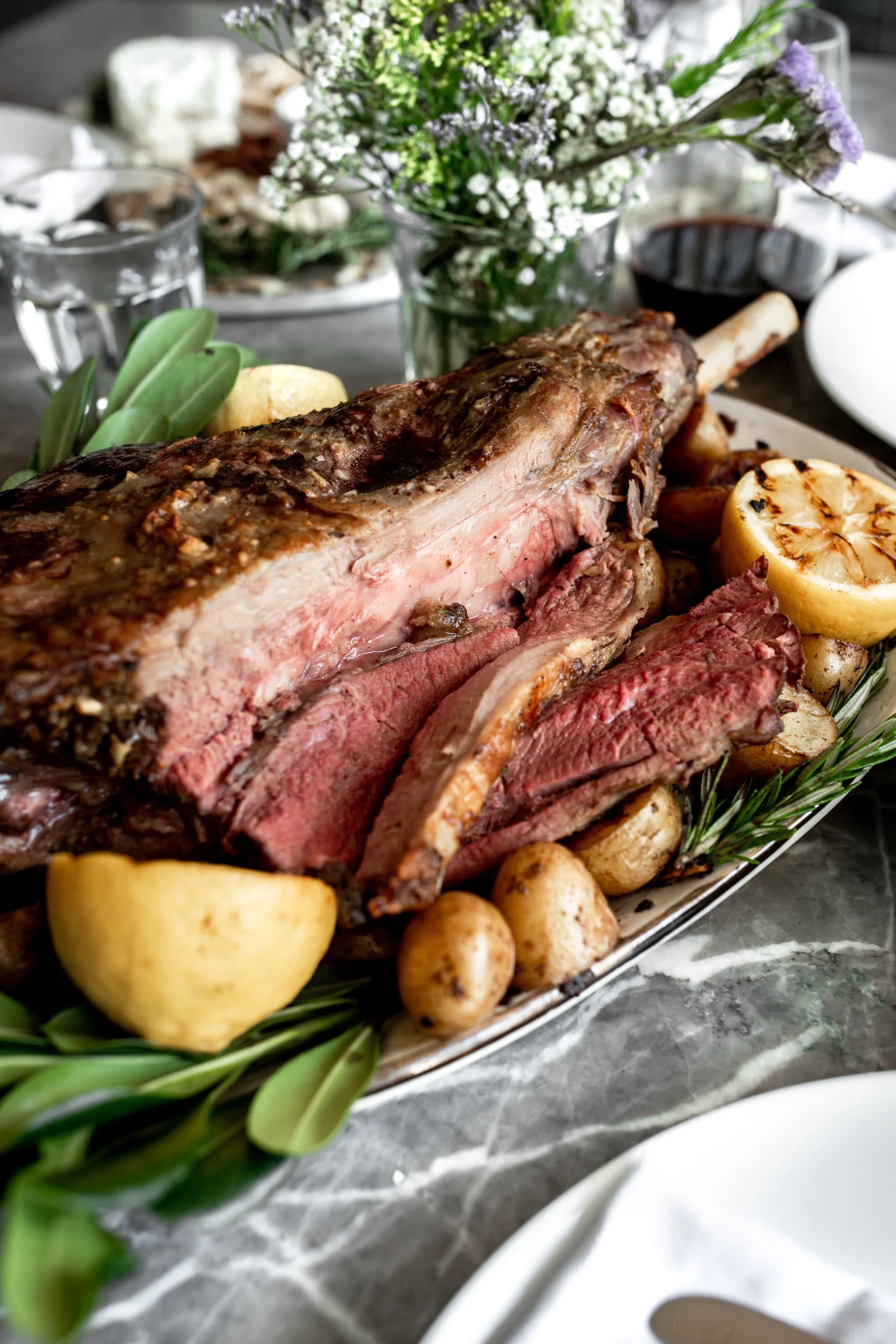 AnchovyGarlic Butter Rubbed Whole Roasted Lamb Leg with Potatoes