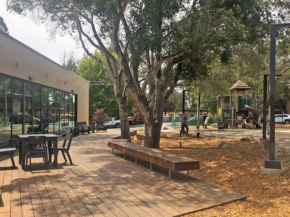  Outdoor deck with adjacent tot lot 
