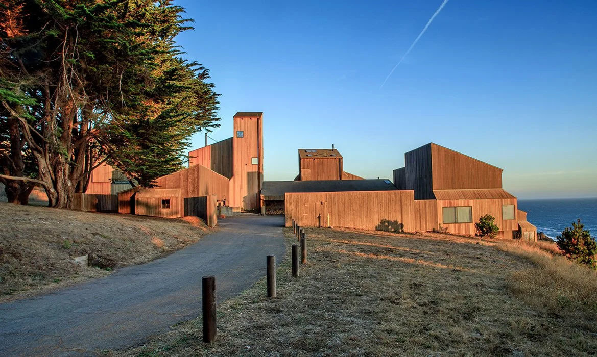   Sea Ranch Condominium One Courtyard Renovation /  TSR's iconic Condominium One courtyard had become a shadow of its design legacy: loose pavers and settling steps, an ad-hoc zigzag handrail, a failing retaining wall, deteriorated decking, and plant