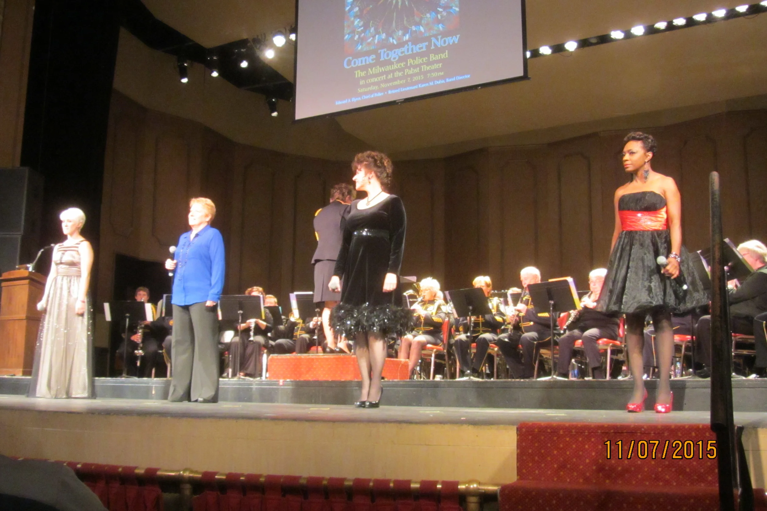 Milwaukee Police Band vocalist's performing in concert together to a Carole King medley. Left to Right-Kerri Jokala, Carrie Moore, Shannon Smikowski, Carolyn Tillman.