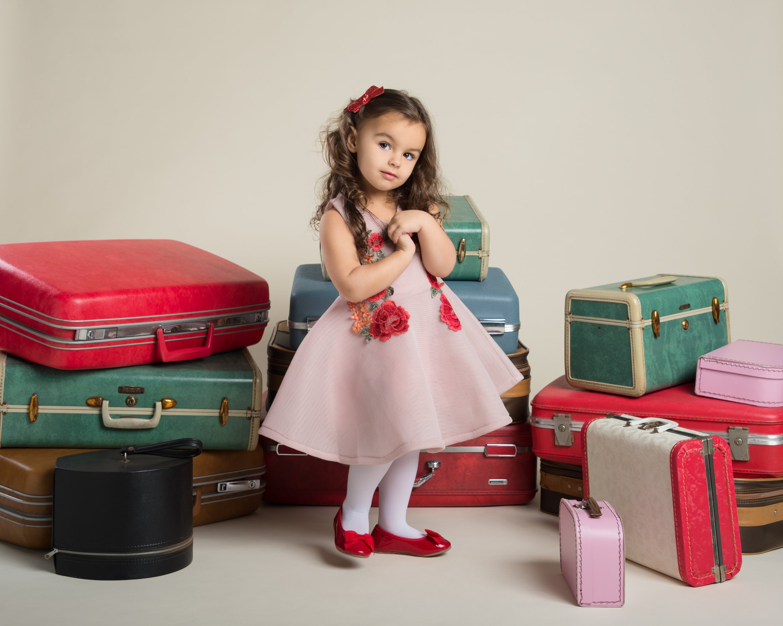 cute-girl-travel-suitcases-fine-art