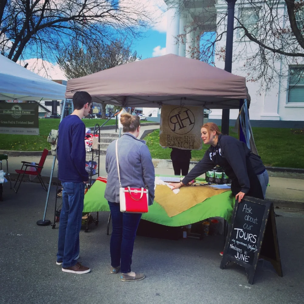 Actively engaging the crowd to touch alpaca fiber products converts them to customers quicker.